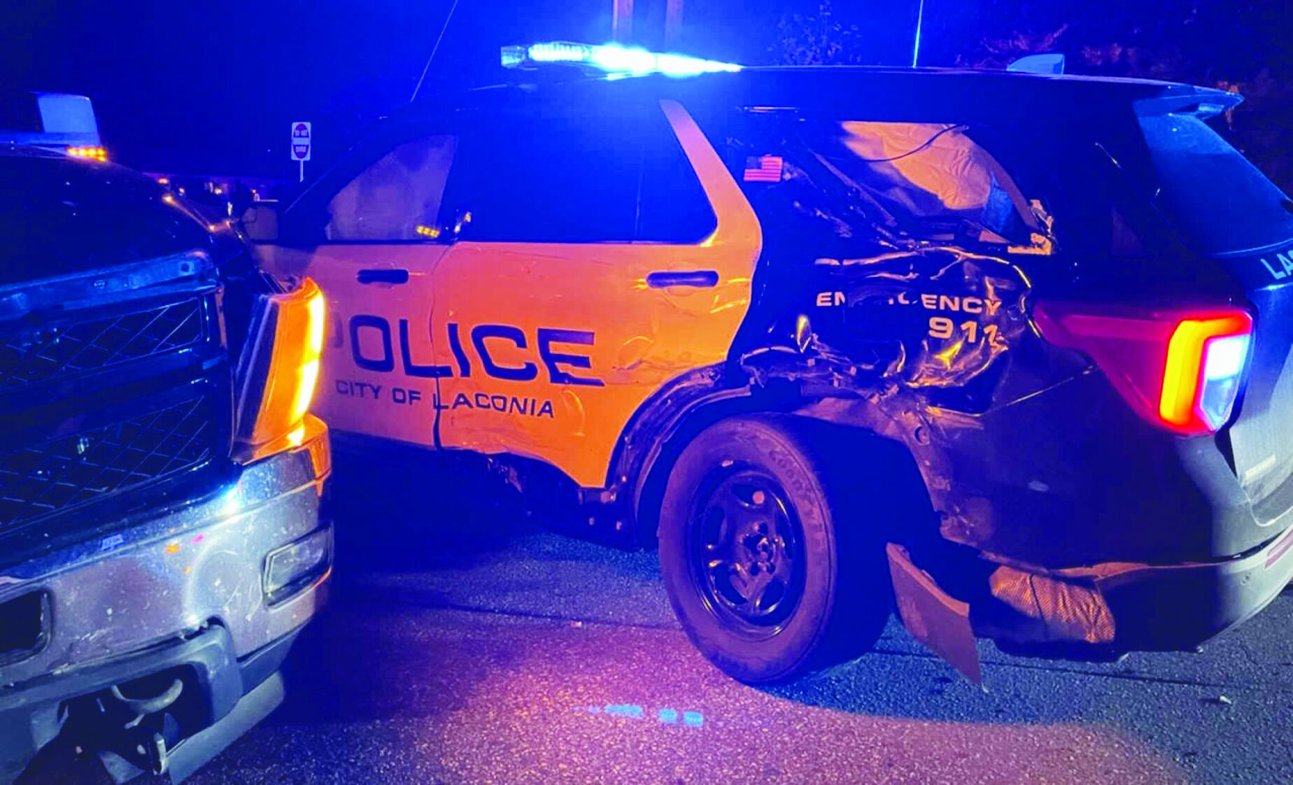 No injuries after parked police cruiser hit by pickup truck Saturday at scene of separate accident